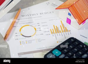 bilancio casa con documenti e calcolatrice