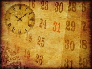 orologio antico su calendario cartaceo