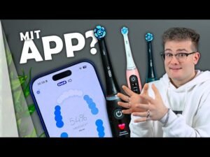 spazzolino oral b con monete e smartphone